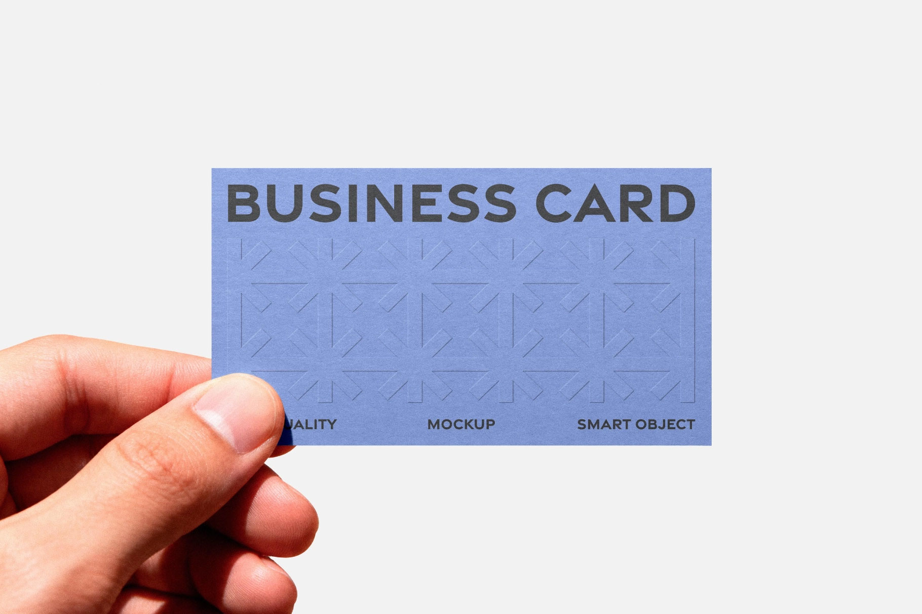 Free Embossed Business Card Mockup in Hand PSD Template