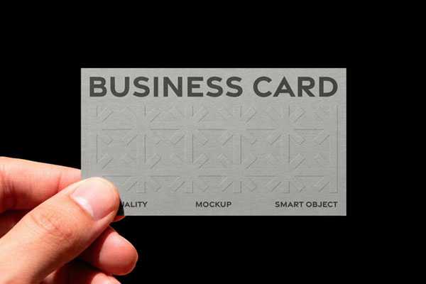Free Embossed Business Card Mockup in Hand PSD Template