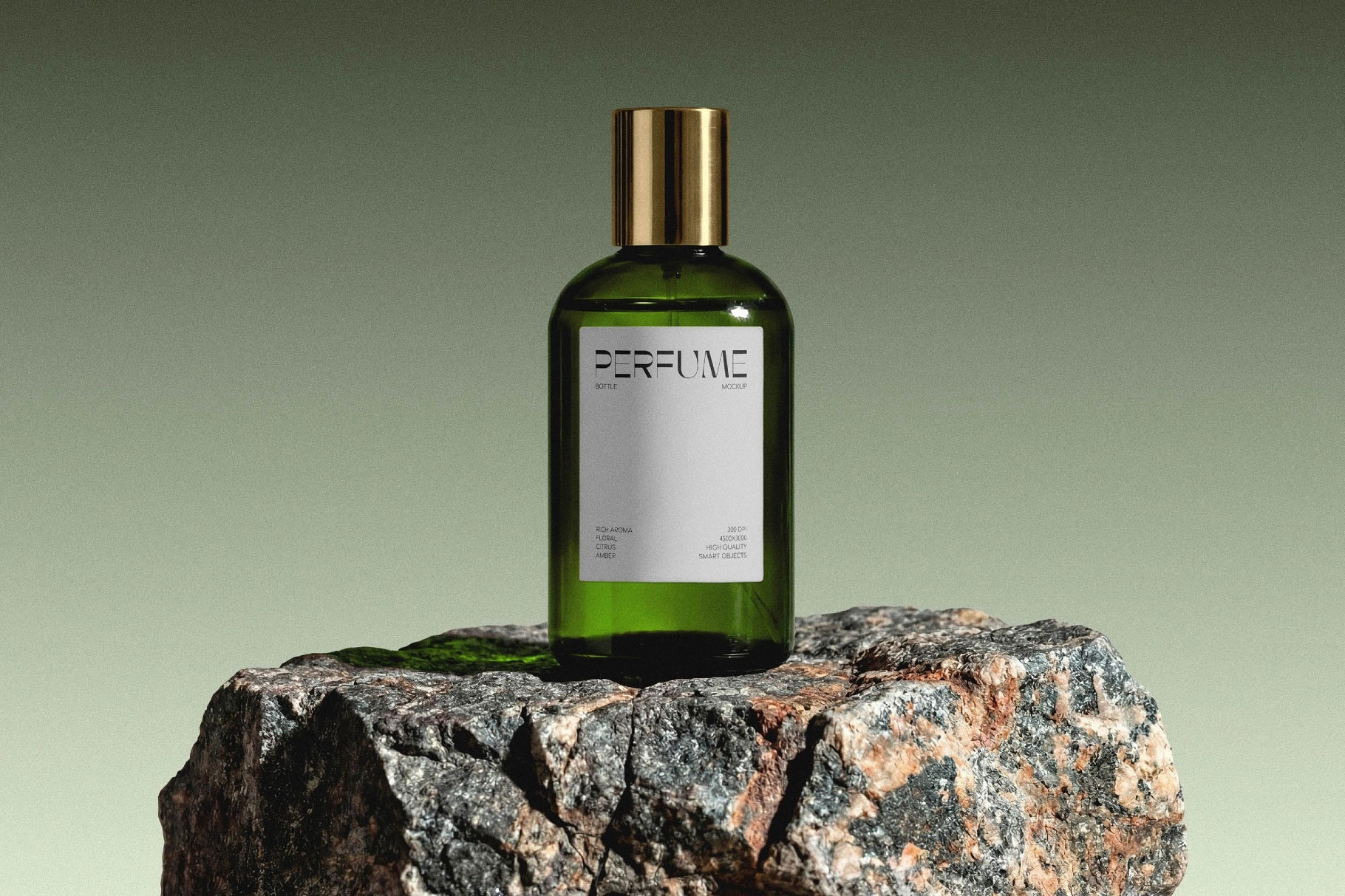 Free Glass Perfume Bottle Mockup on Stone PSD Template