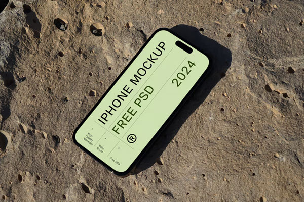 Free iPhone Pro on Rock Mockup PSD Template