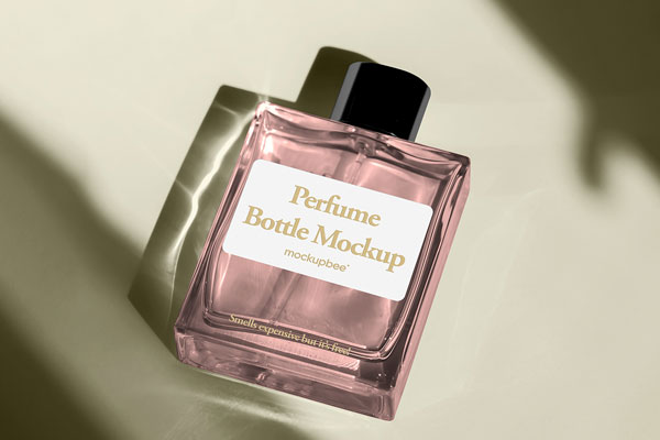 Free Lying Perfume Bottle Mockup PSD Template