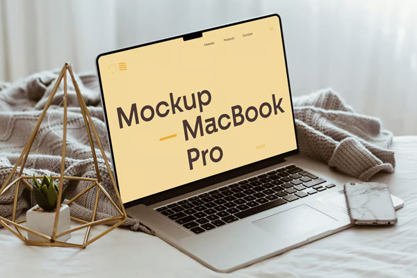 Free MacBook Pro Lying on Bed Mockup PSD Template