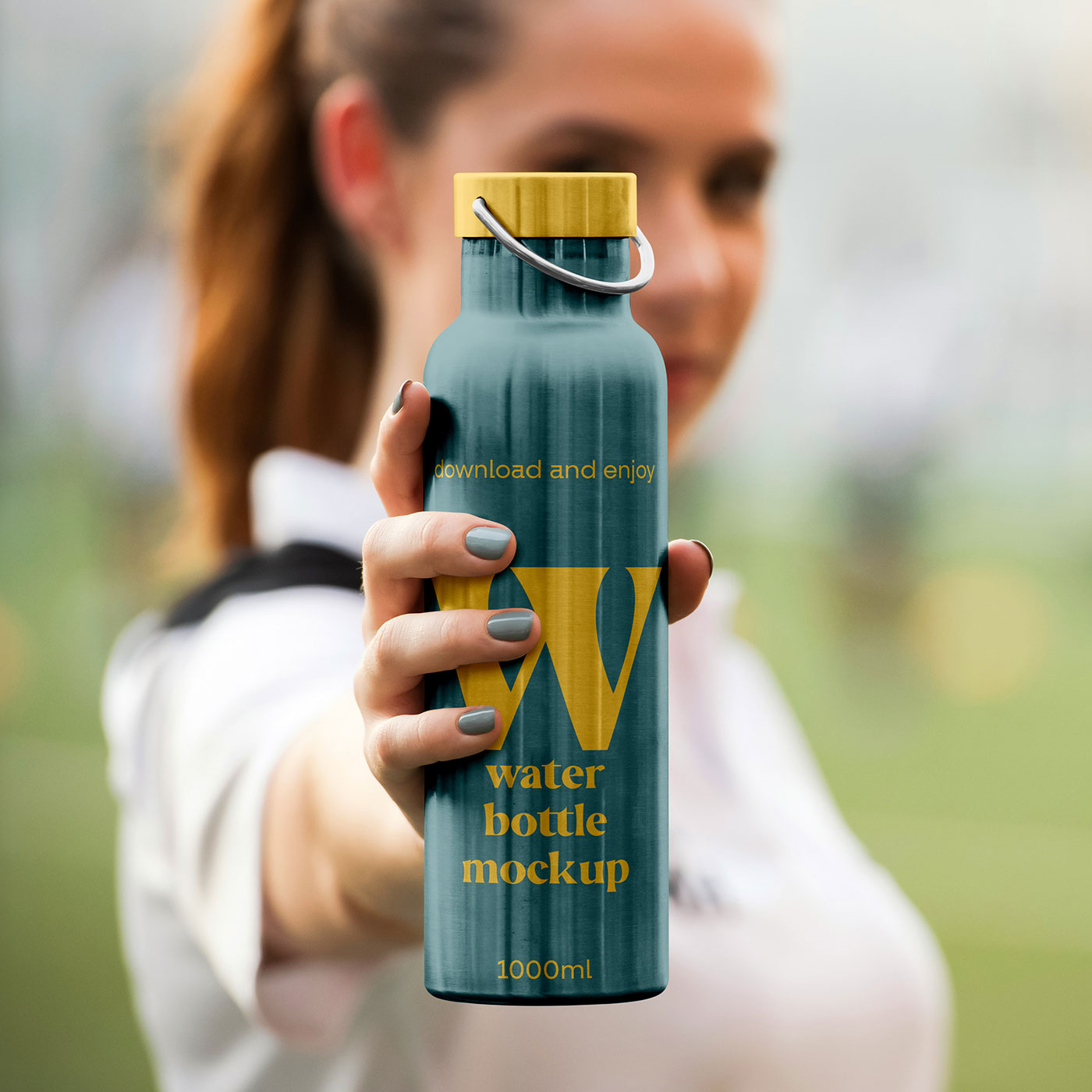 Free Metal Water Bottle in Hand Mockup PSD Template