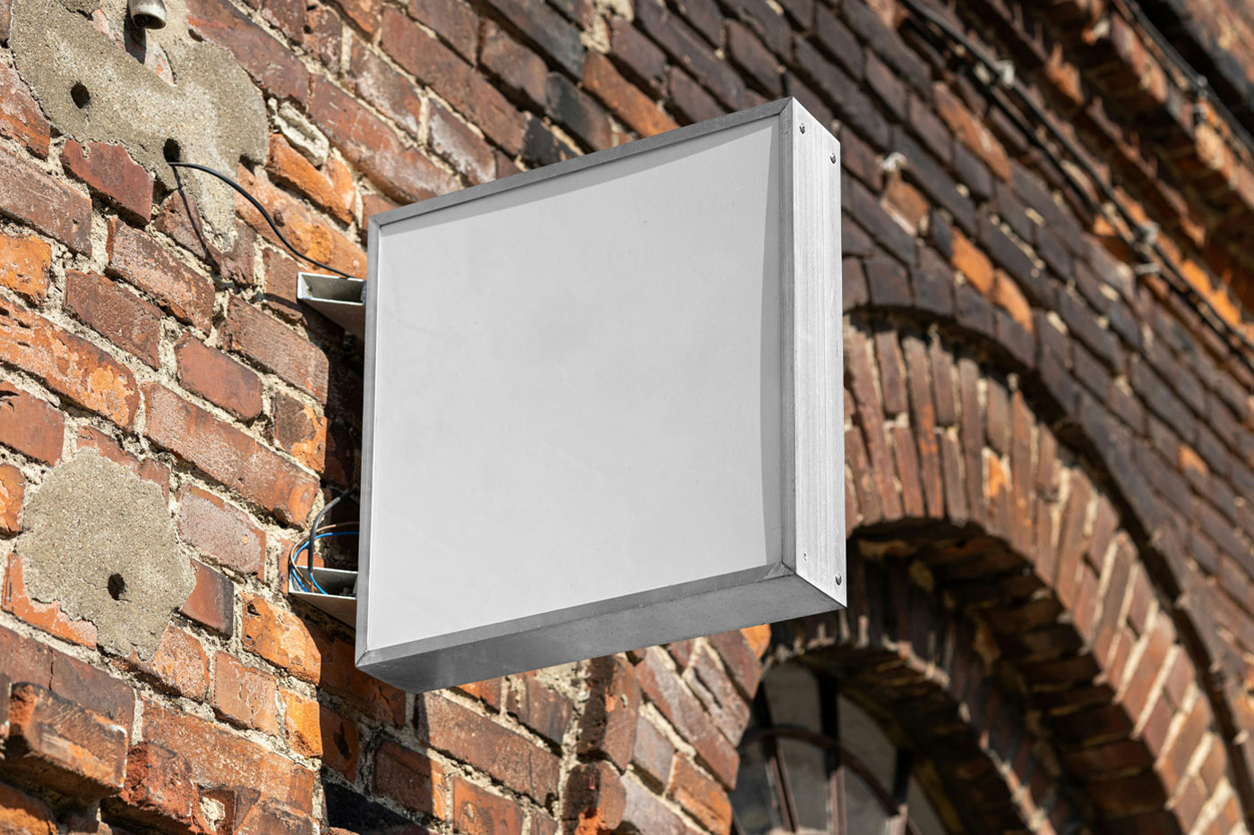 Free Sign Attached to Wall Mockup PSD Template