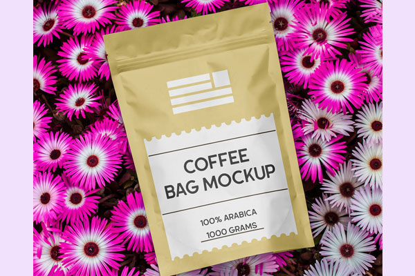 Free Coffee Bag on Flowers Mockup PSD Template
