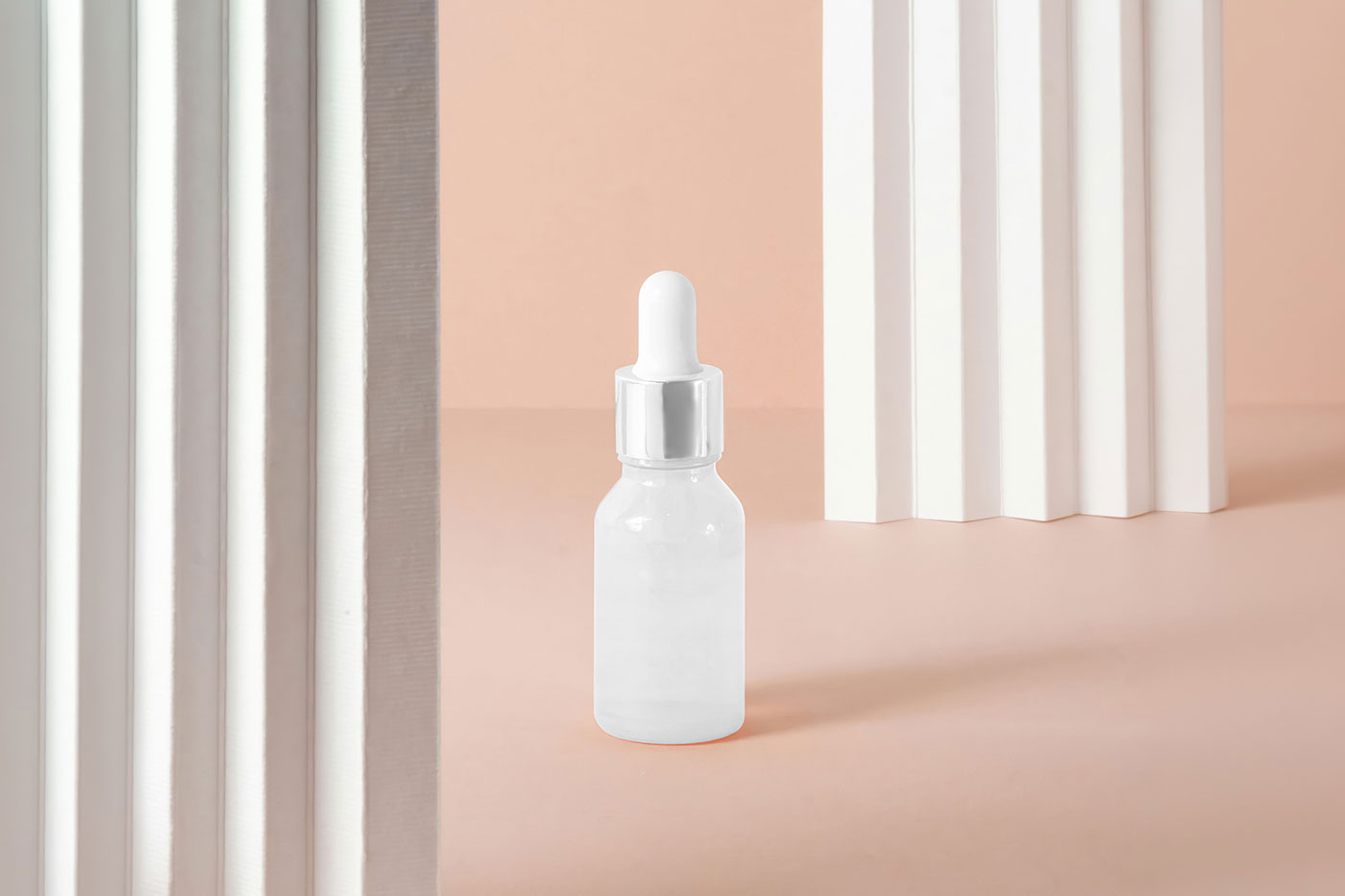Free Cosmetic Dropper Bottle Mockup PSD Template