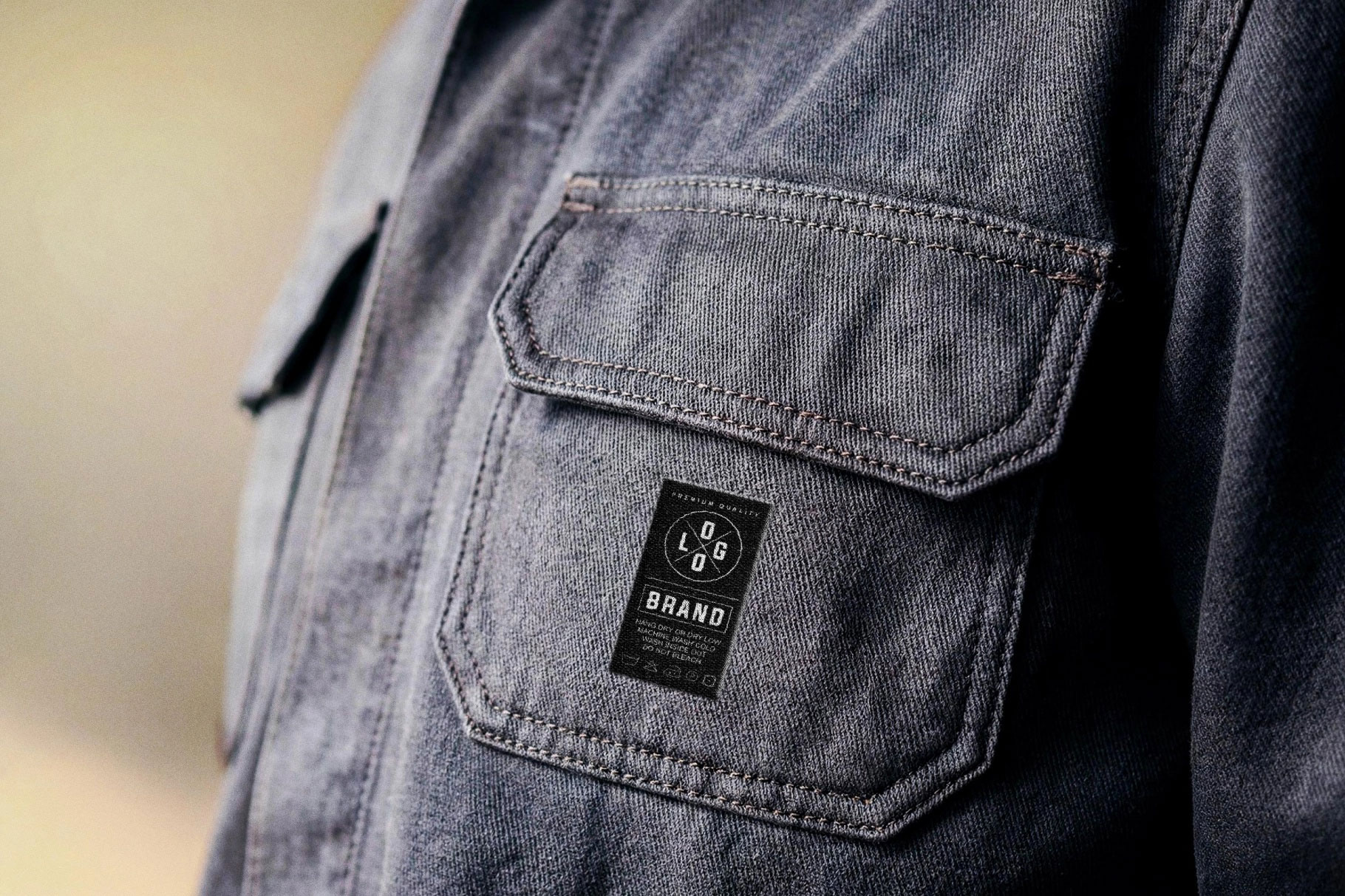 Free Denim Fabric Emblem Mockup PSD Template