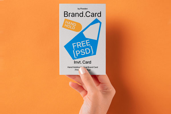 Free Hand Holding Vertical Brand Card Mockup PSD Template