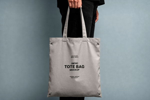 Free Handheld Tote Bag Mockup PSD Template