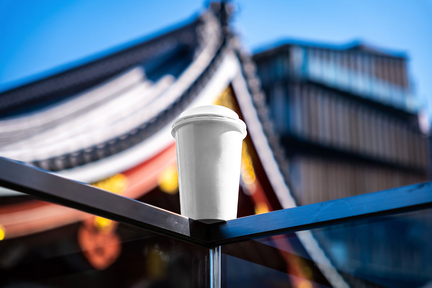 Free Medium Paper Cup on Railing Mockup PSD Template
