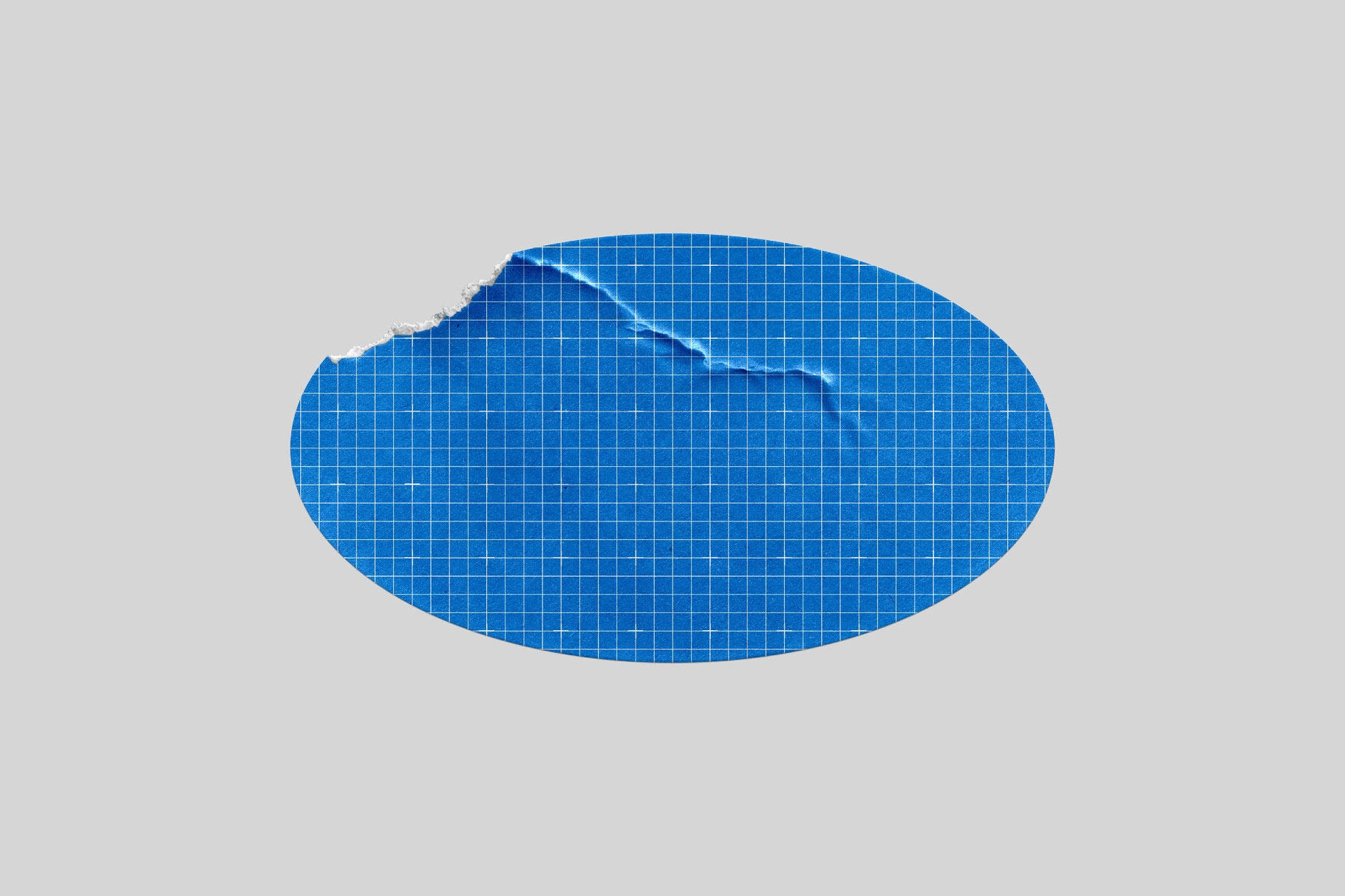 Free Ripped Oval Sticker Mockup PSD Template