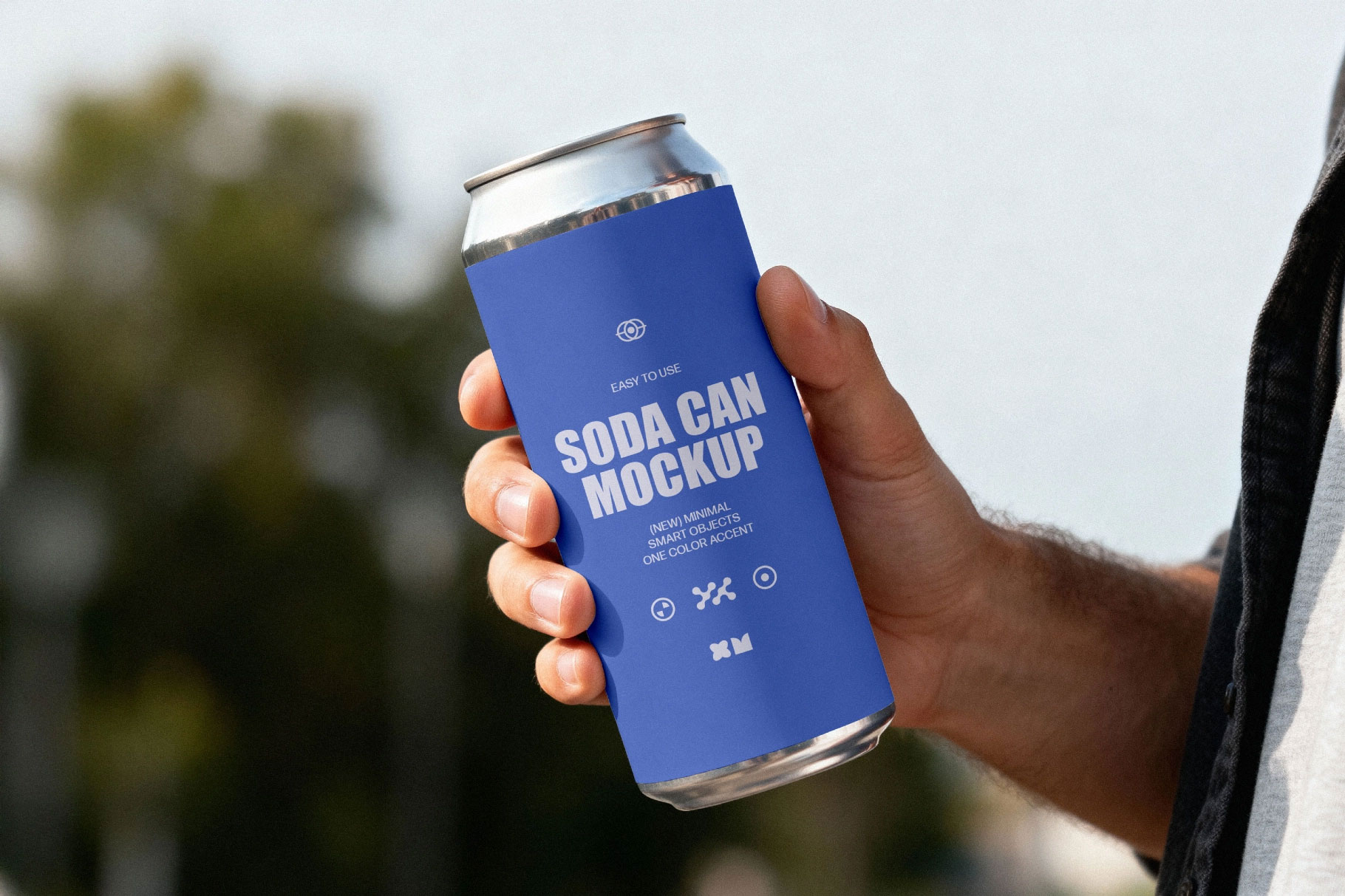 Free Soda Can Mockup in Hand PSD Template