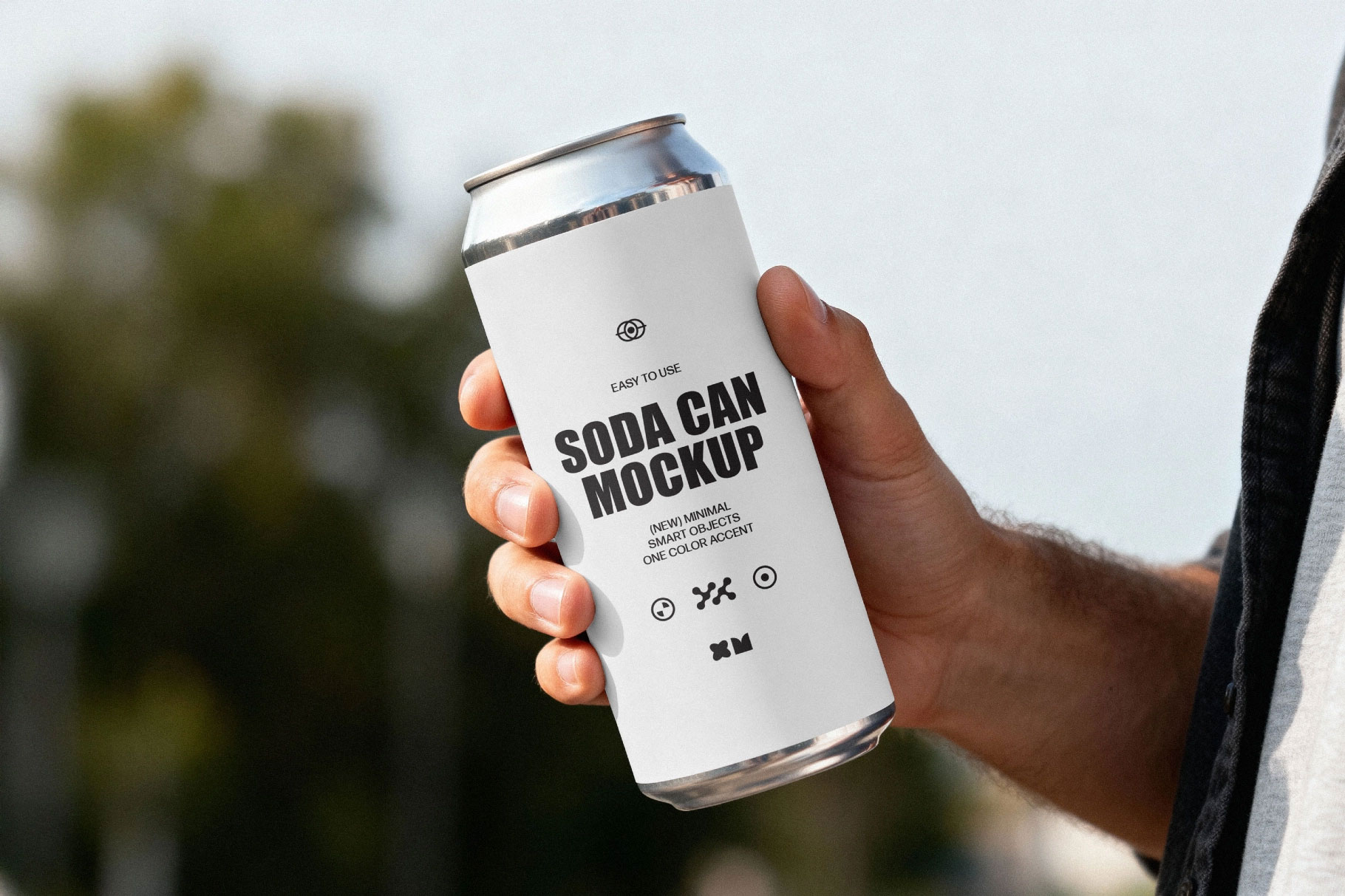 Free Soda Can Mockup in Hand PSD Template