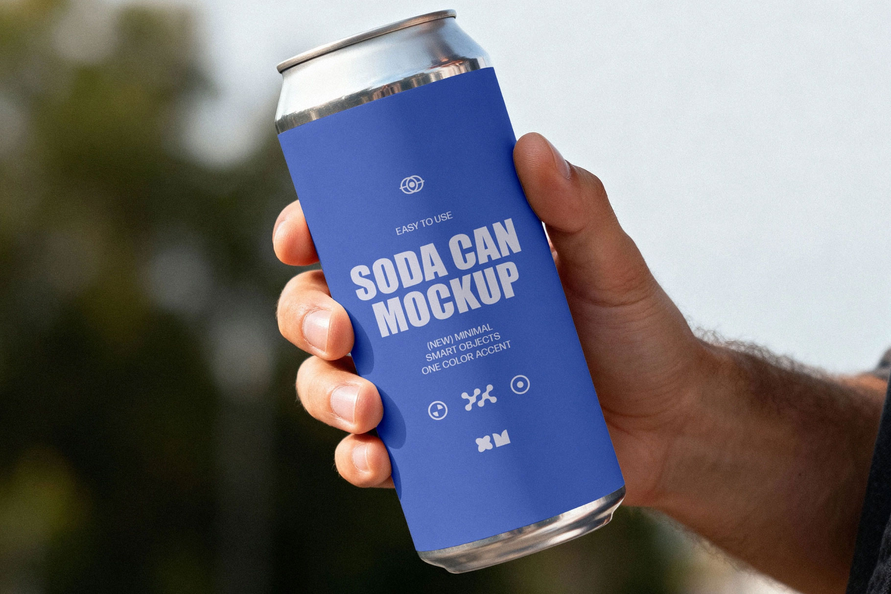 Free Soda Can Mockup in Hand PSD Template