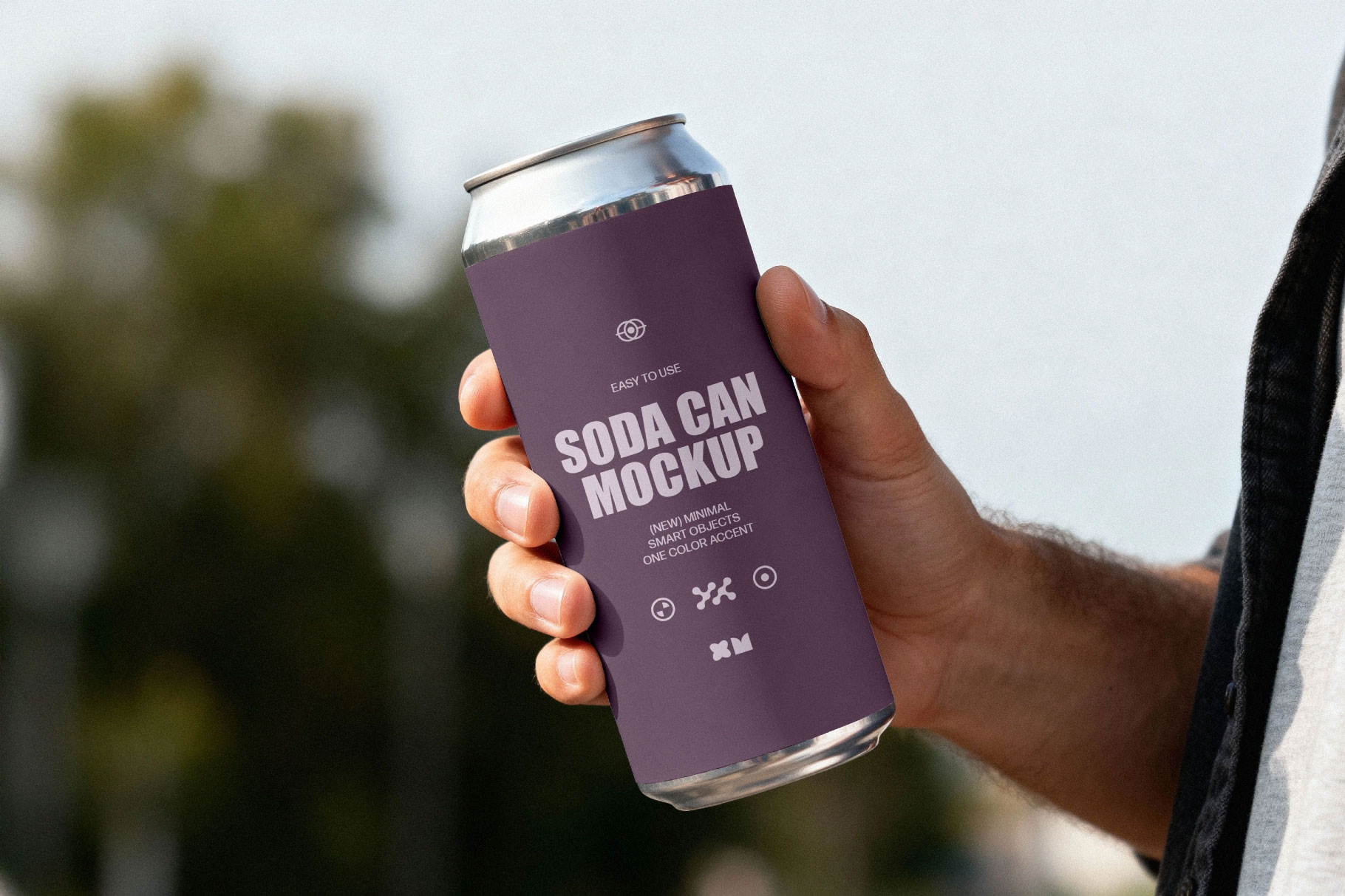 Free Soda Can Mockup in Hand PSD Template