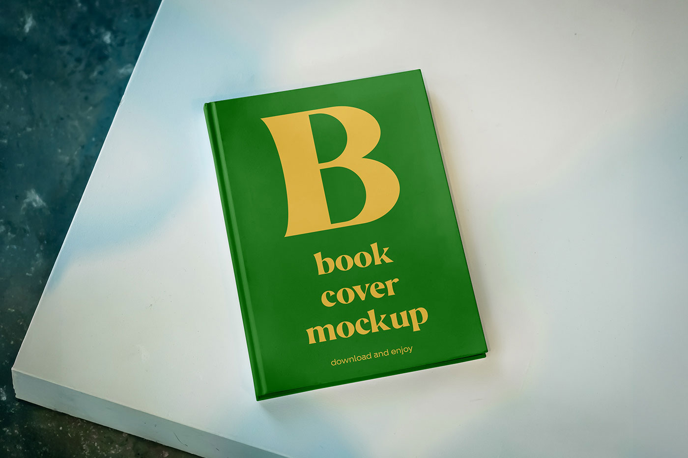 Free Book Cover on Table Mockup PSD Template