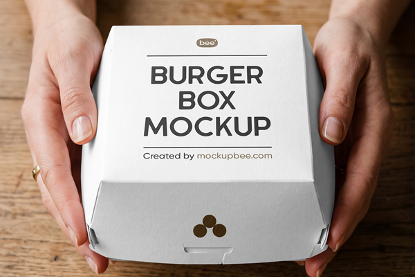 Free Burger Box in Hands Mockup PSD Template