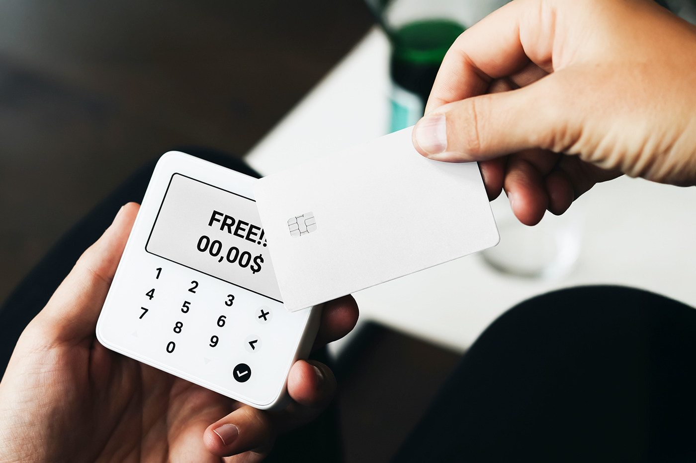 Free Credit Card in Hand Mockup PSD Template