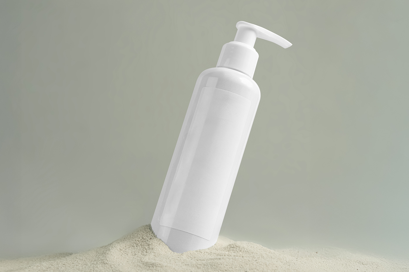 Free Dispenser Bottle on Sand Mockup PSD Template