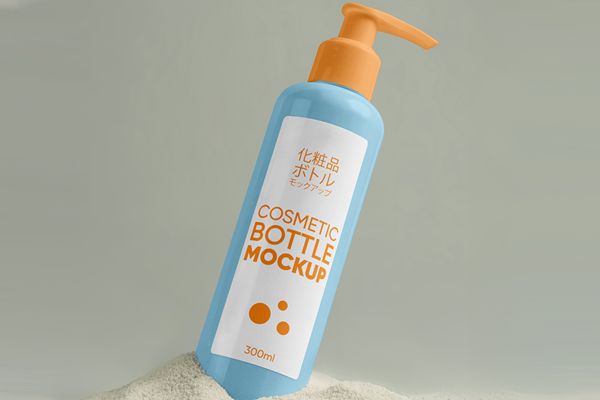Free Dispenser Bottle on Sand Mockup PSD Template