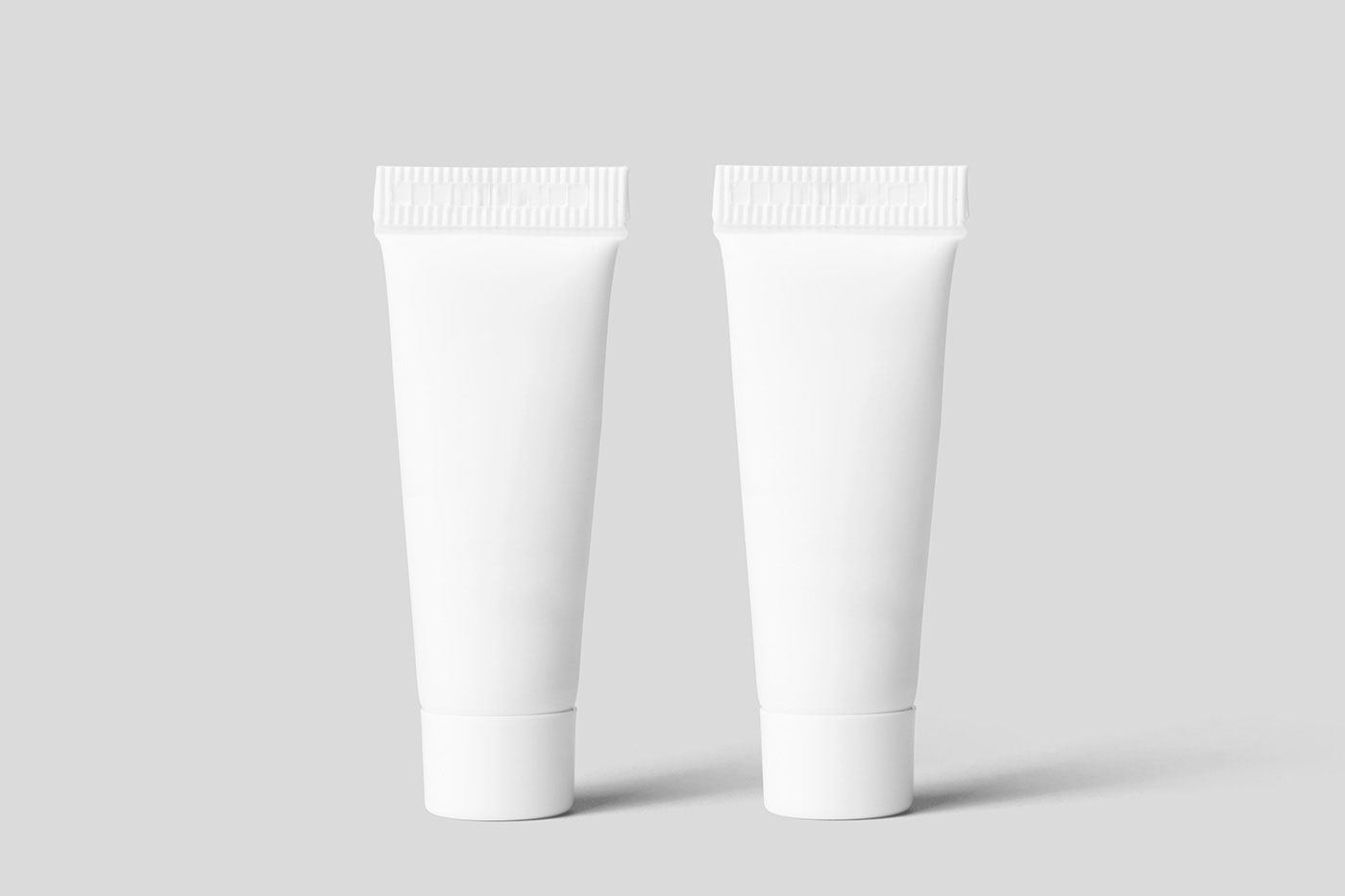 Free Double Tiny Cosmetic Tube Mockup PSD Template