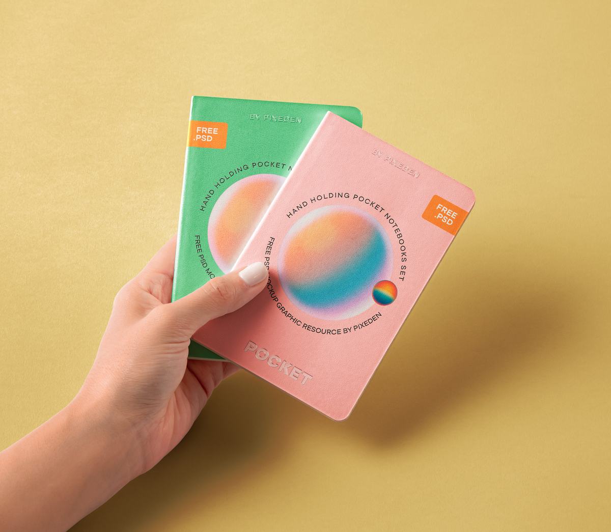 Free Hand Holding Pocket Notebooks Mockup PSD Template