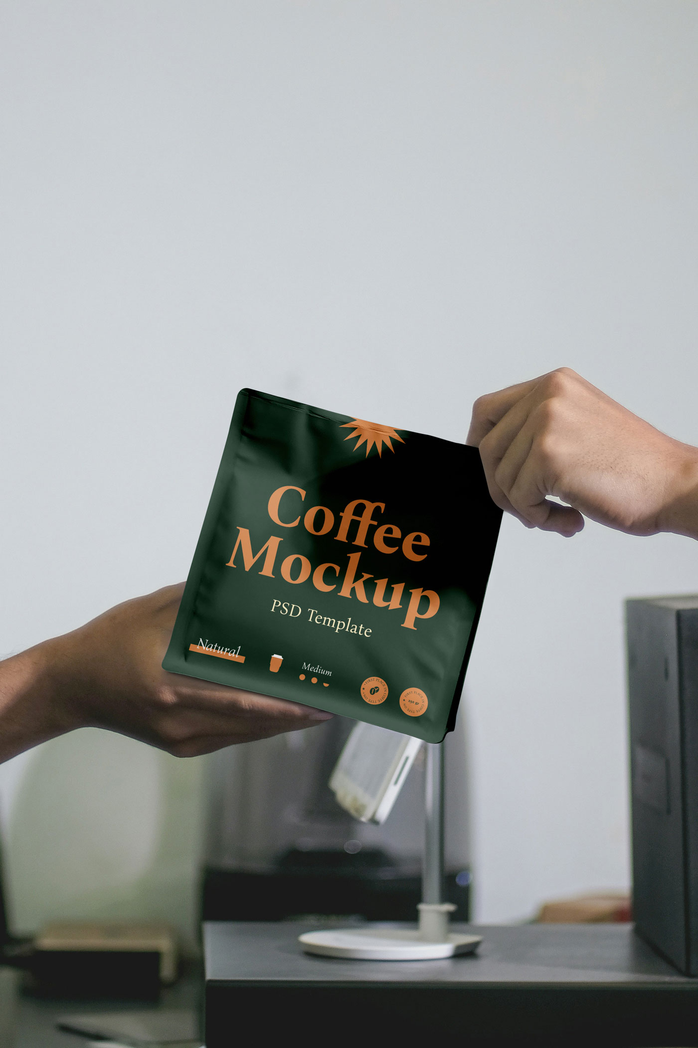 Free Hands Holding Coffee Bag Mockup PSD Template
