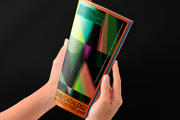 Free Hands Holding Folded Magazine Mockup PSD Template