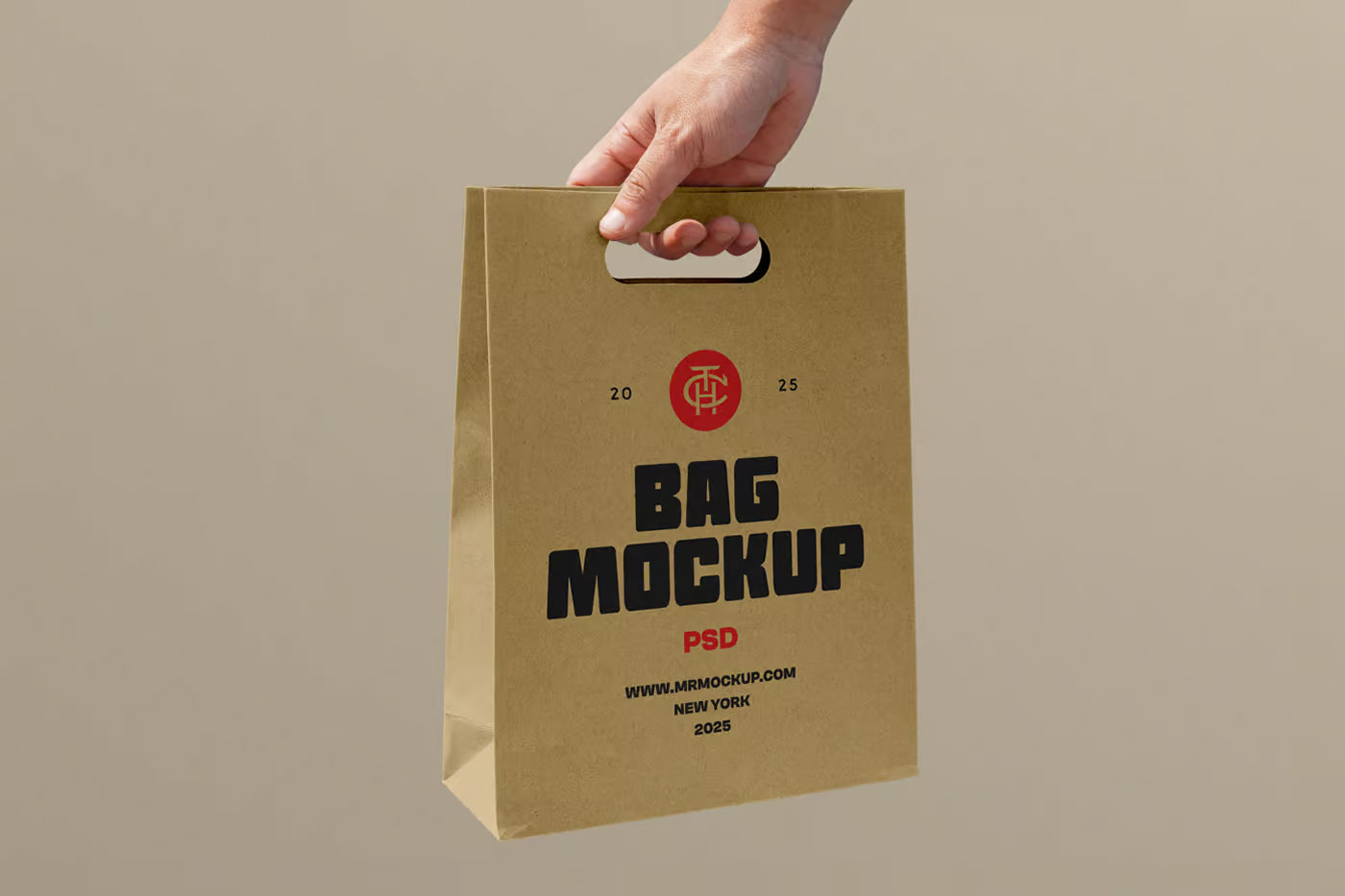 Free Holding Craft Paper Bag Mockup PSD Template