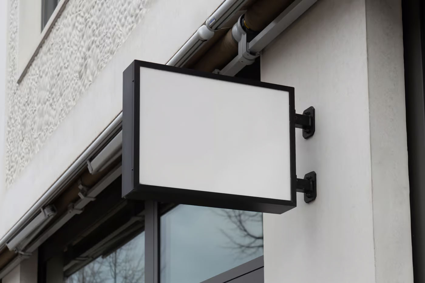 Free Horizontal Sign on Wall Mockup PSD Template