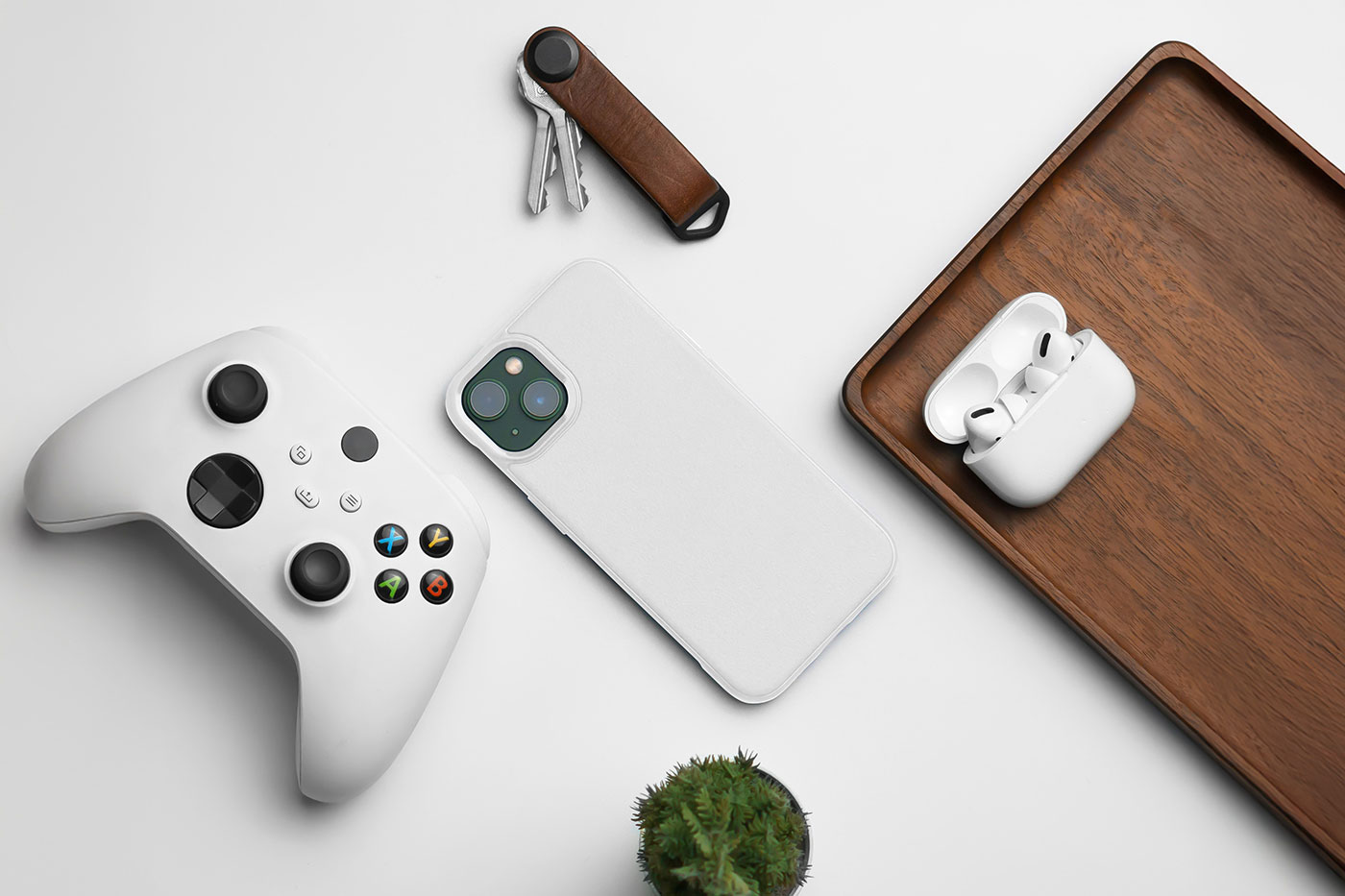 Free iPhone Case Mockup on Table PSD Template