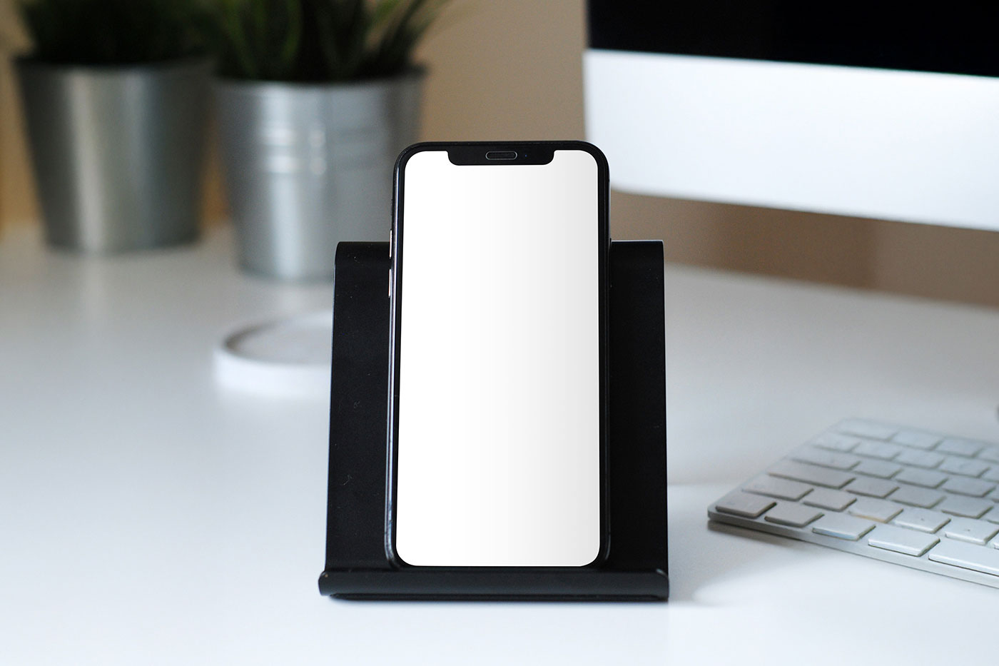 Free iPhone in Stand Mockup PSD Template