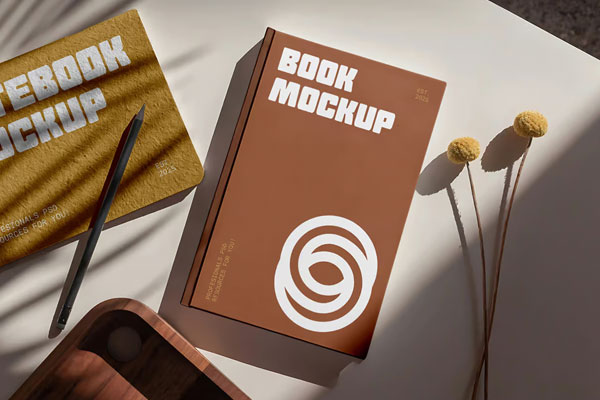 Free Laying Hard Cover Book Mockup PSD Template