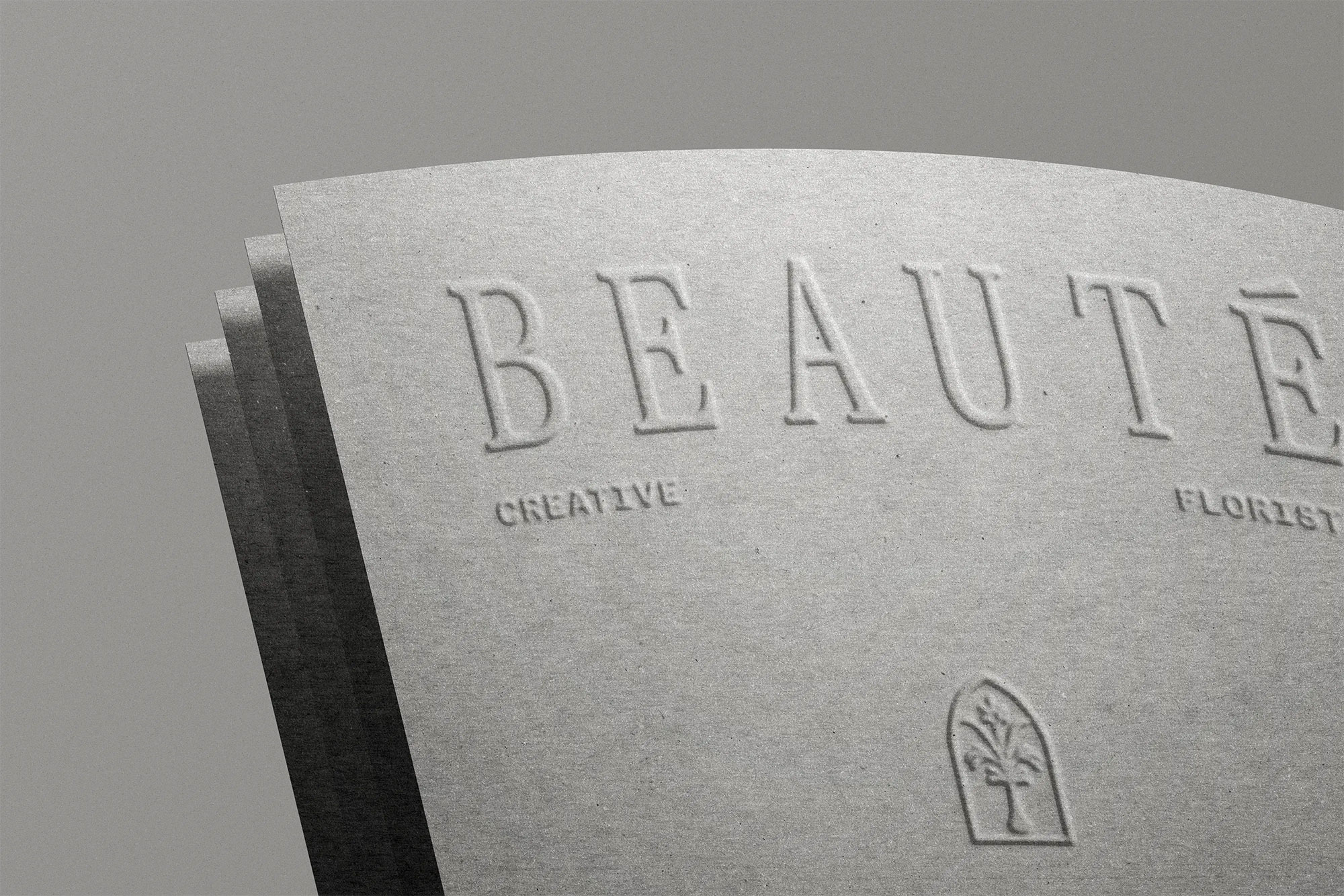 Free Logo Design on Paper Mockup PSD Template