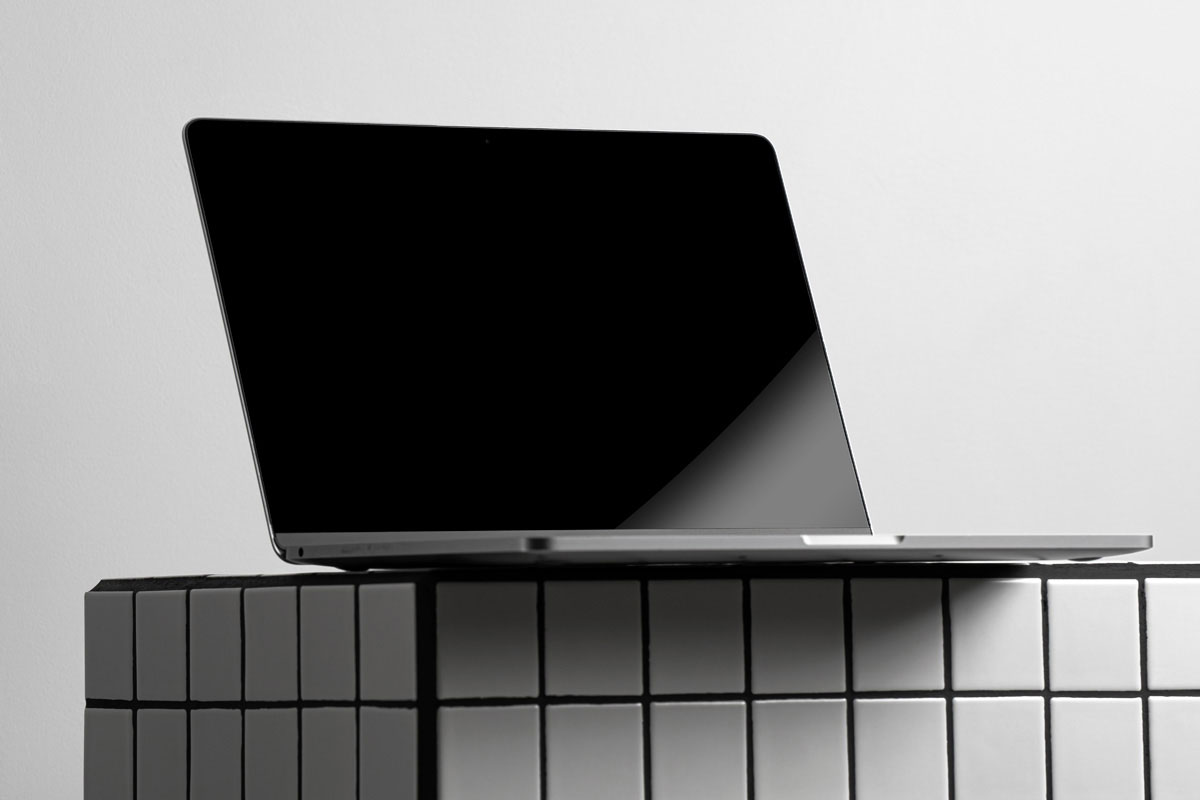 Free MacBook Pro Scene Mockup PSD Template