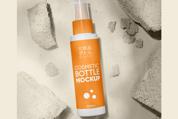 Free Sticker Label Cosmetic Bottle Mockup PSD Template