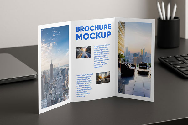 Free Trifold Brochure on Desk Mockup PSD Template