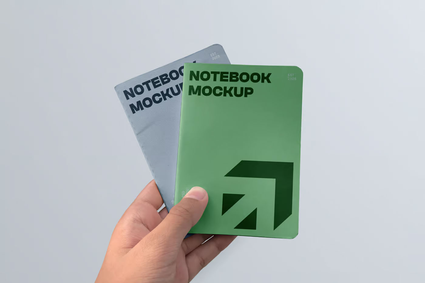 Free Two Notebook in Hand Mockups PSD Template