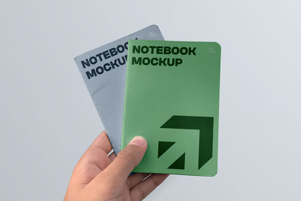 Free Two Notebook in Hand Mockups PSD Template