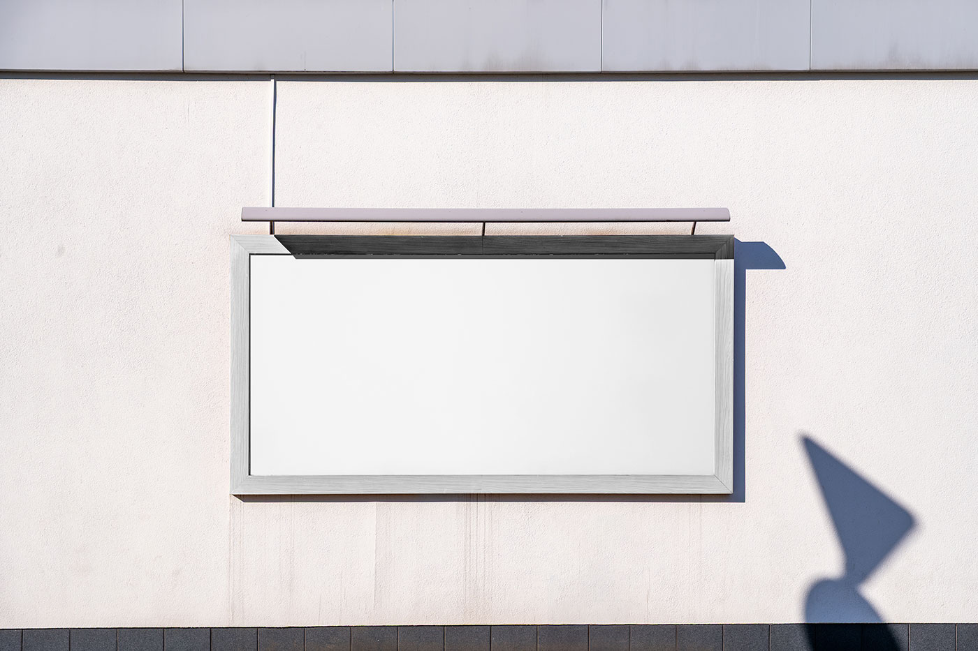 Free Shadow Billboard on Wall Mockup PSD Template