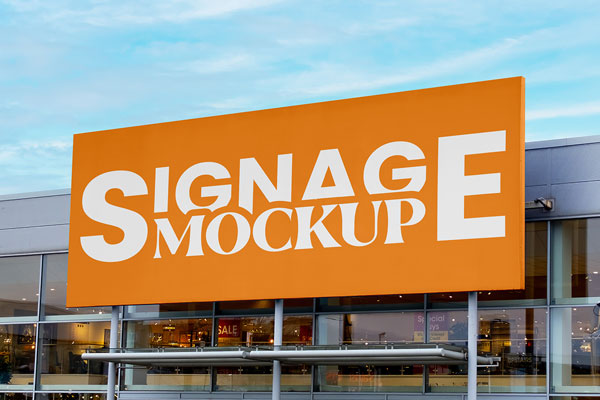 Free Signage on Big Shop Mockup PSD Template