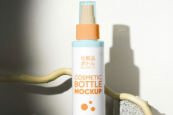 Free Spray Bottle on Rock Mockup PSD Template