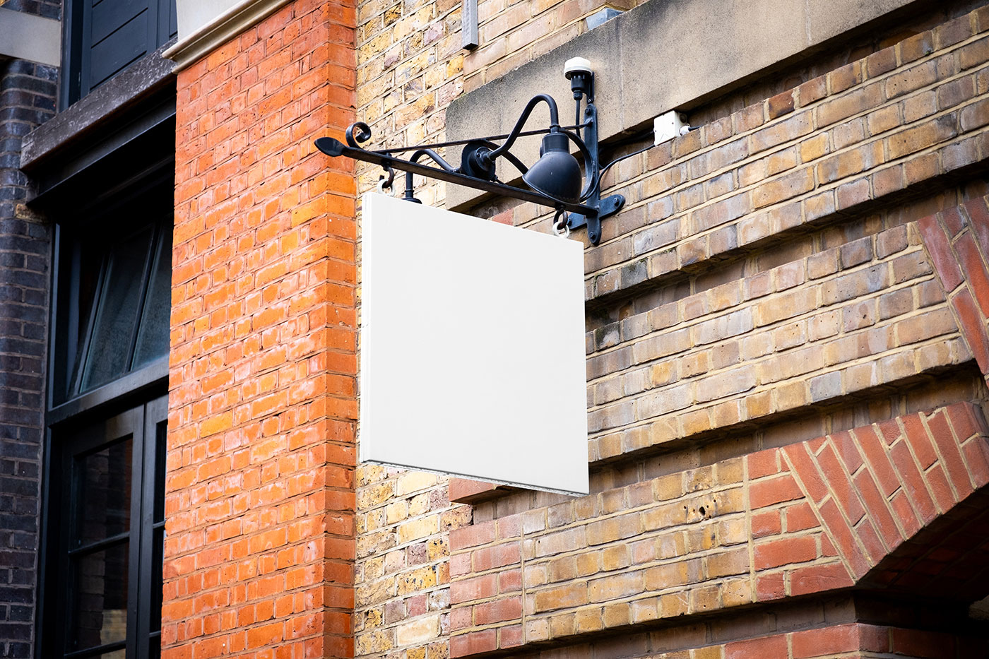 Free Square Sign on Brick Wall Mockup PSD Template