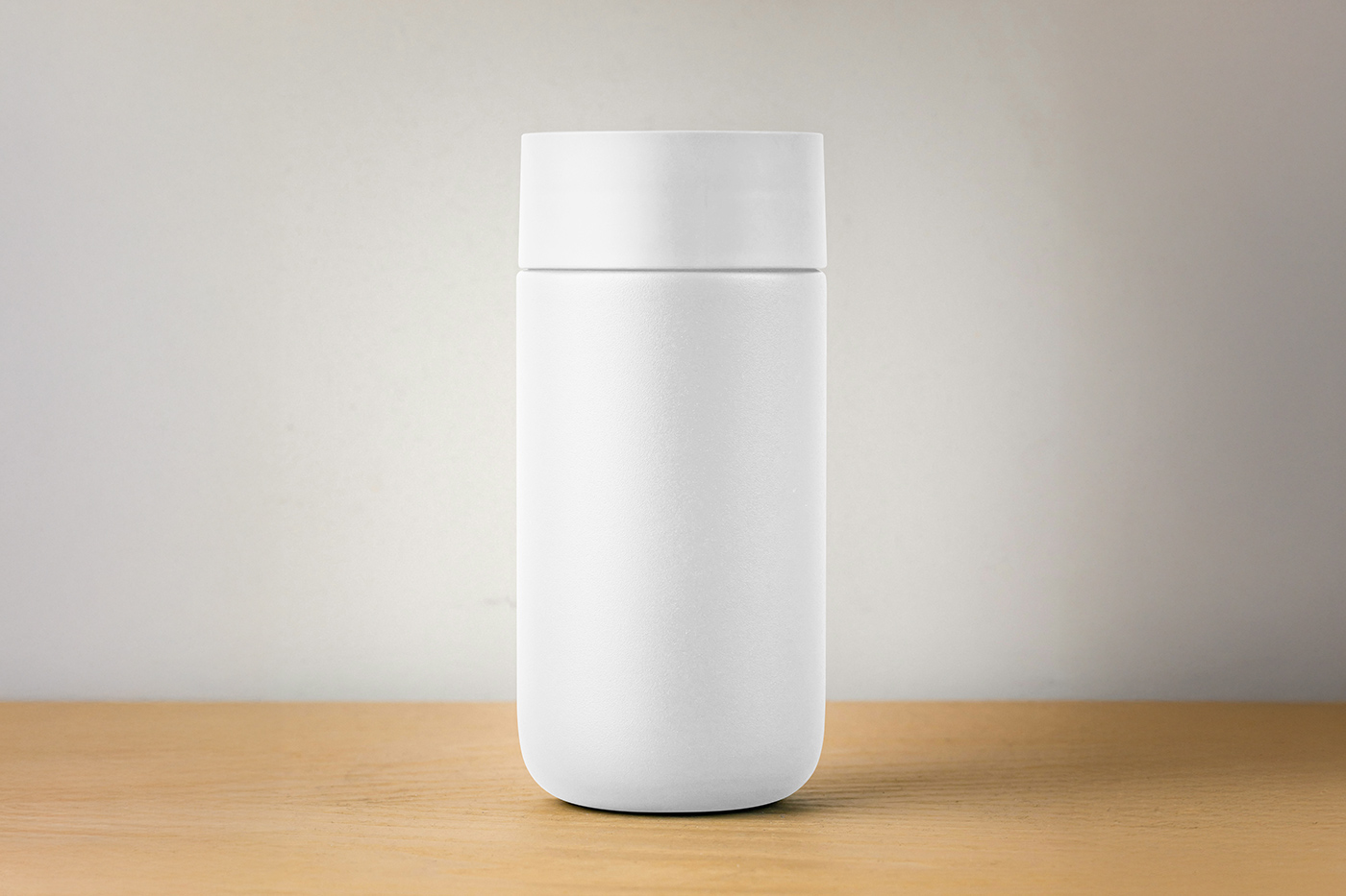 Free Thermos Bottle on Desk Mockup PSD Template