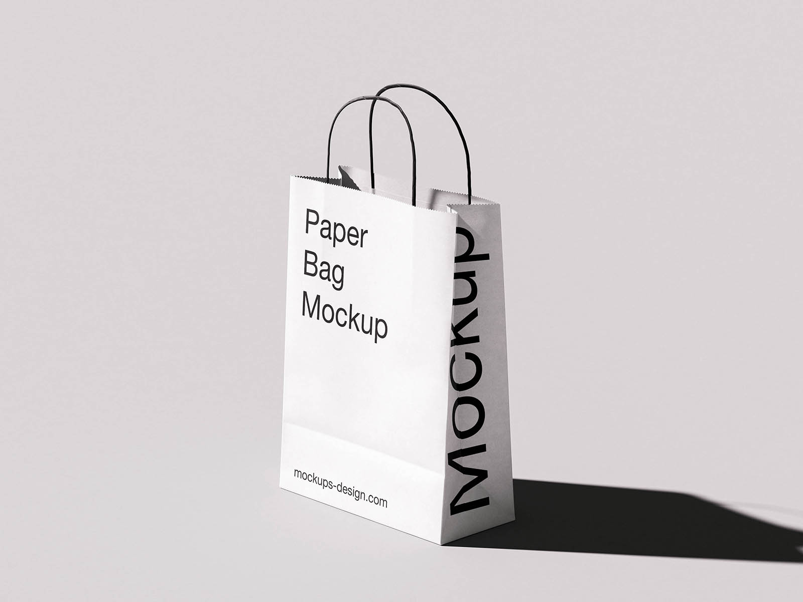 Free Twisted Handle Paper Bag Mockup PSD Template