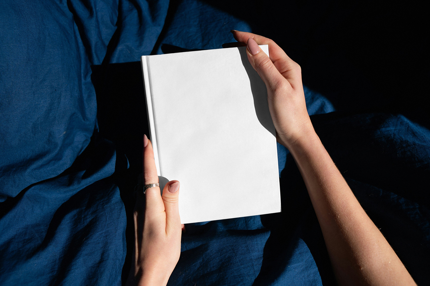 Free Woman Holding Book Mockup PSD Template