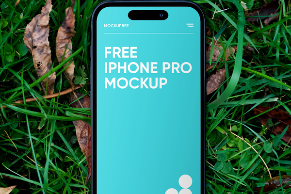 Free iPhone on Grass Mockup PSD Template