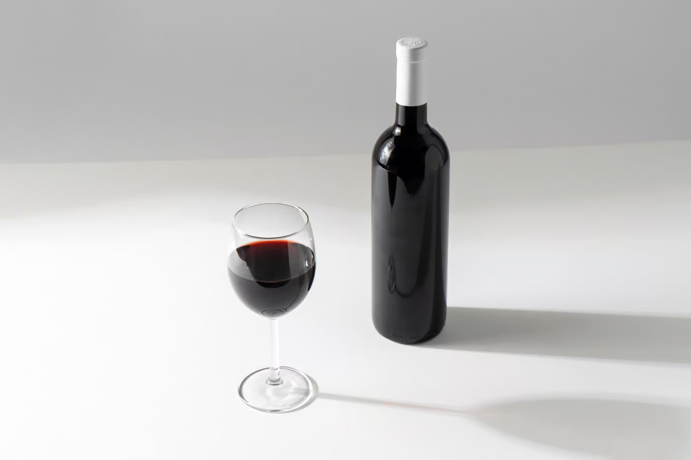 Free Wine Bottle Glass Mockup PSD Template