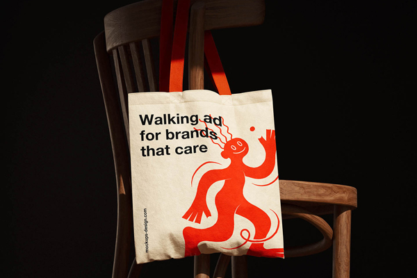 Free Canvas Tote Bag on Chair Mockup PSD Template