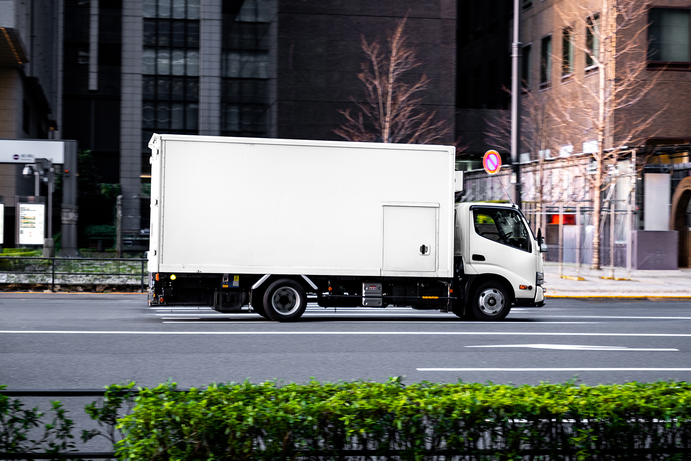 Free Delivery Truck on Street Mockup PSD Template